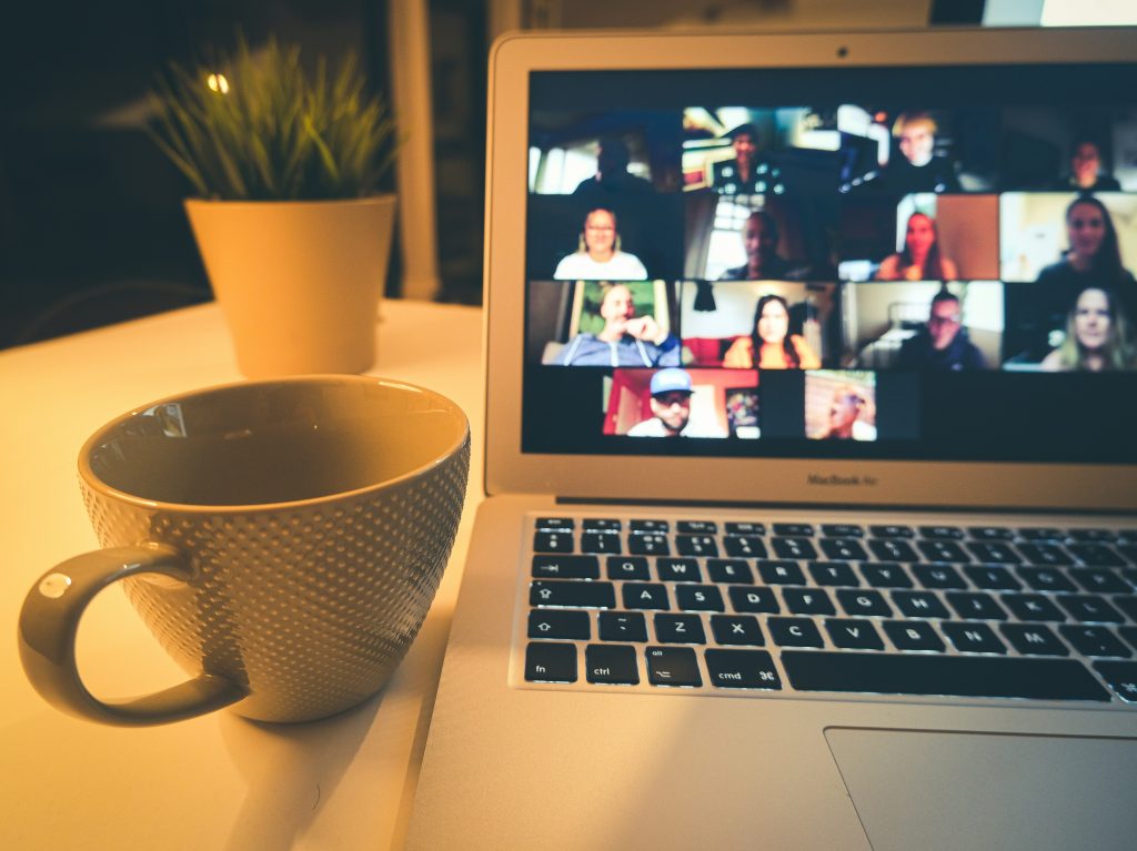 A member joining a gathering from home, the circle on the screen
